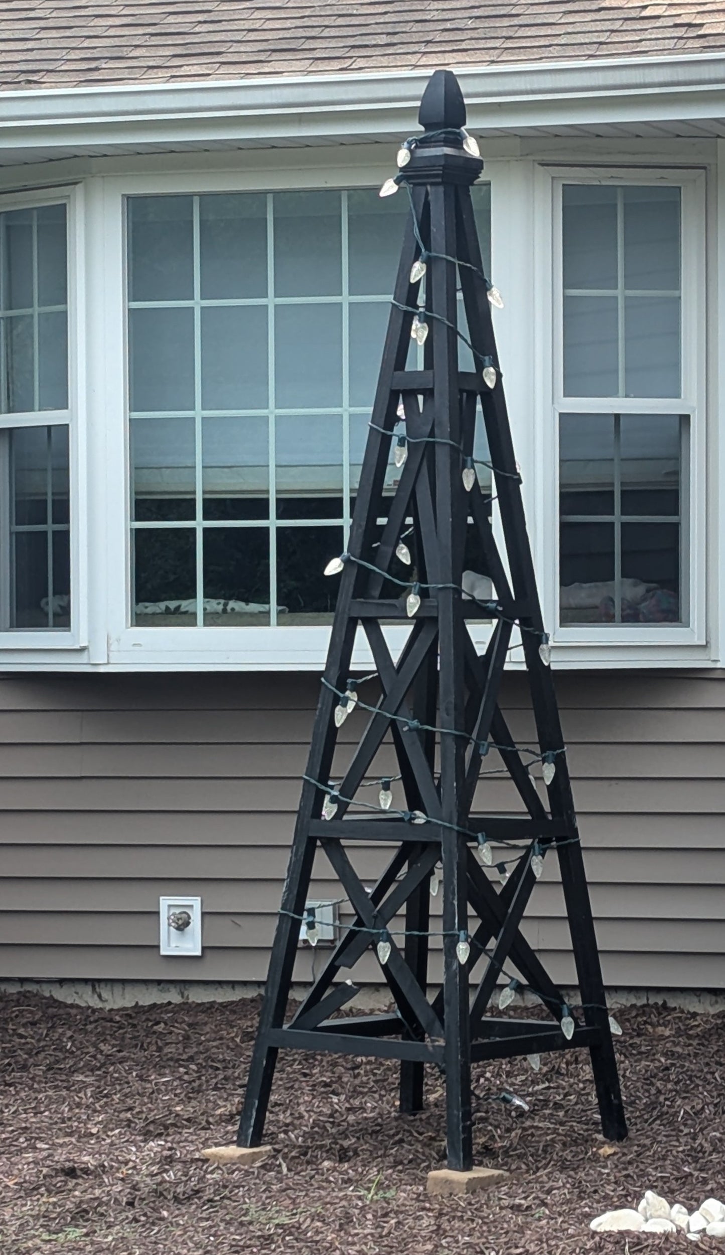 c) Obelisk Trellis, "X" Style 7.5'